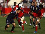 Matchvinder. Med sin 29. scoring på landsholdet sørgede Shinji Okazaki (t.v.) for 2-1-sejr til Japan og en 99 procent sikker VM-billet. 