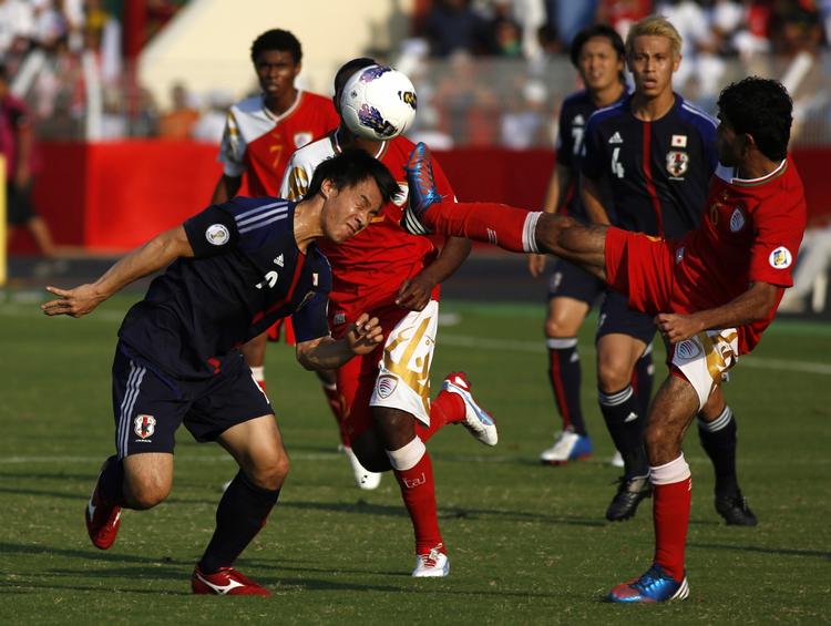Matchvinder. Med sin 29. scoring på landsholdet sørgede Shinji Okazaki (t.v.) for 2-1-sejr til Japan og en 99 procent sikker VM-billet. 