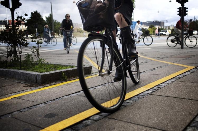 Varemærke. De to debattører, mener at cyklisterne netop vil vise sig at være Københavns redning, og ikke byens største trafikproblem. 