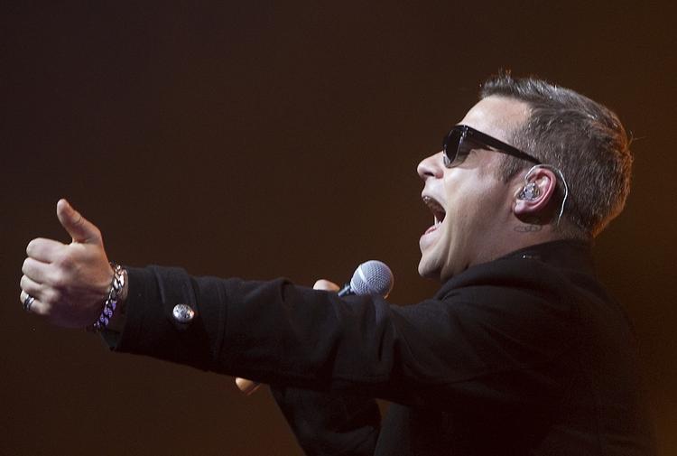 Musik. Robbie Williams er her stadig. Nu med nyt album og ny turne. Her er han i Parken i 2006. 