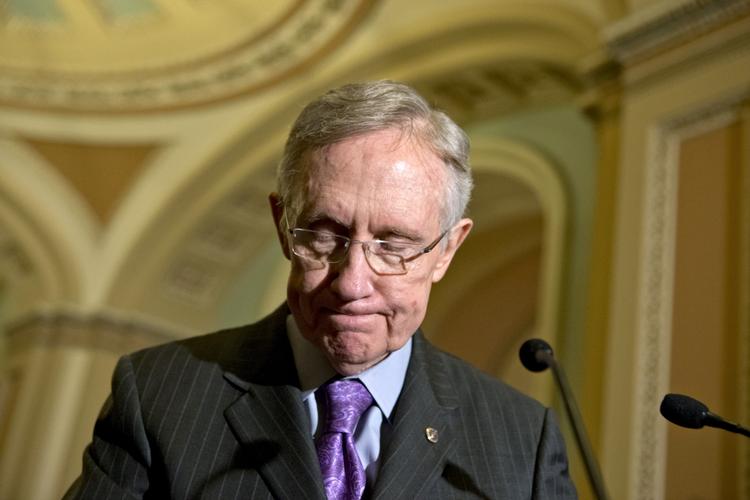 Afgrund. »Det ser ud til, at vi er på vej i den retning. At USA ryger ud over afgrunden«, siger demokraten Reid ved et ekstraordinært møde i Senatet i Washington. 
