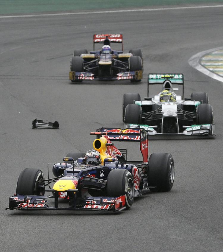 andenviolin. Red Bulls Sebastian Vettel (forrest) skal næste år have Daniel Ricciardo (bagerst) som holdkammerat. 