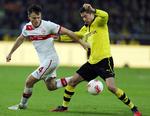 fodskade. William Kvist (tv) i kamp for Stuttgart mod mestrene fra Dortmund. 