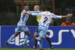 Videre? Malaga sikrede sig plads blandt de sidste 16 i Champions League ved at spille 1-1 mod Milan i fjerde runde af årets turnering. 