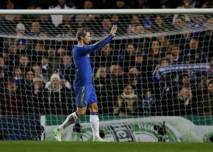 afdæmpet. Fernando Torres har netop scoret for Chelsea  i kampen mod FC Nordsjælland - og jubler vist over målet. 