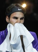 Slået. Federer lukkede 2012 ved at tabe sæsonfinalen til Novak Djokovic. 
