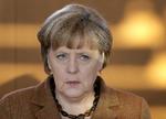 tilfreds. Tysklands kansler, Angela Merkel, mener, at det banktilsyn, som EU's finansministre blev enige om efter maratonforhandlinger i nat, er godt for EU. 