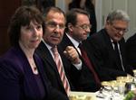 fortalelse? Det er den russiske viceudenrigsminister, Mikhail Bogdanov (nr. 3 fra venstre), der har skabt forvirring, da han i går sagde, at en sejr til de syriske oprørere er en mulighed. Rusland er en af Syriens få internationale venner. 