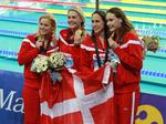 VERDENSMESTRE. Med en europarekord blev Pernille Blume, Jeanette Ottesen, Rikke Møller Pedersen og Mie Ø. Nielsen verdensmestre i 4x100 meter medley. 