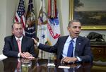 Forhandlinger. John Boehner får et klap på skulderen af Barack Obama, men præsidenten vil have republikanerne til at komme ham endnu mere i møde. 