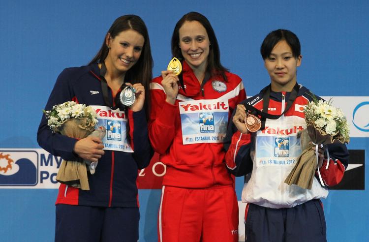 GULD. Som den eneste af danskerne vandt Rikke Møller Pedersen (i midten) to guldmedaljer, da hun i 200 meter brystsvømning besejrede amerikaneren Laura Sogar (tv.) og japaneren Kanako Watanabe. 