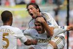 Big. Laudrup skal danse med sidste års Champions League-vindere i semifinalen. Her er Swanseas Danny Graham, der jubler efter en scoring. 