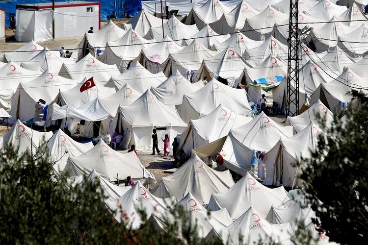Krig. Konflikten i Syrien har ført til flere asylansøgere i Danmark, mener Socialdemokraterne. Her er en flygtningelejr i Tyrkiet, der grænser op til Syrien. 