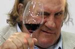 SKATTEFLUGT. Depardieu må tage stilling: Skal den gode franske rødvin erstattes af belgisk trappistøl eller russisk vodka? 