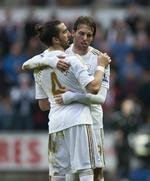 TOPSCORER. De mange mål Michu (th.) scorer for Swansea har vakt opsigt hjemme i Spanien. 