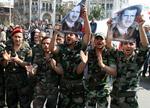 Syriske soldater demonstrerer i sympati med Præsident Assad i Damaskus. 