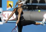 HOPLA. Caroline Wozniacki var i fint humør under træningen forud for sin første kamp ved Australian Open. 