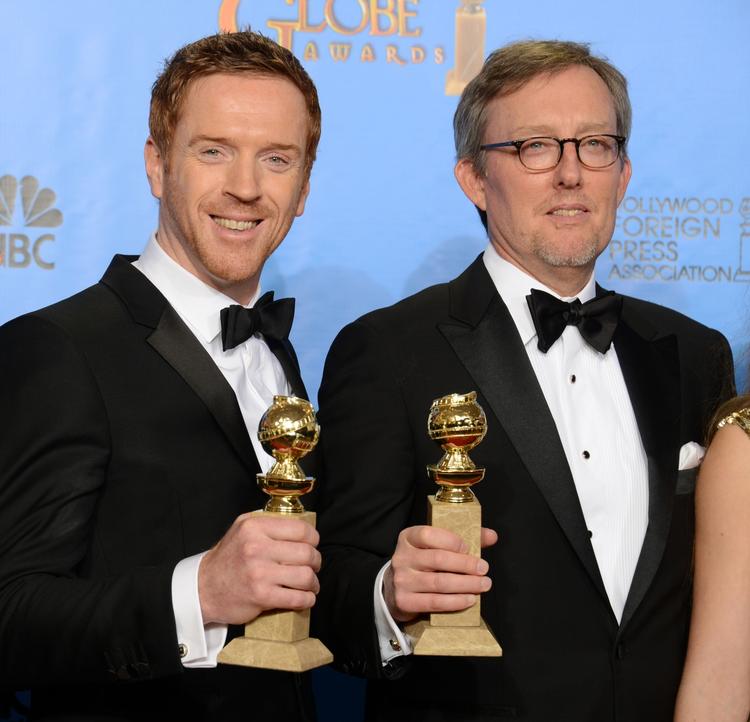 Hollywood. Skuespilleren Damian Lewis og produceren Alex Gansa poserer ved Golden Globes-uddelingen. 