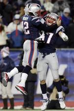 legende. New England Patriots quarterback Tom Brady (tv) fejrer en pasning til et touchdown i en tidligere kamp. 