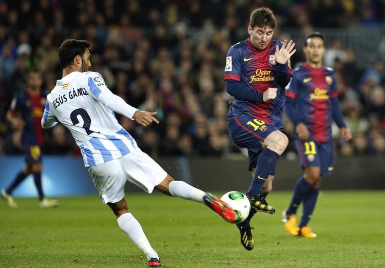 2-2. Lionel Messi scorede for Barca, men fik også et yderst sjældent gult kort for at brokke sig. 