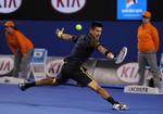 yderligt. der blev spillet helt ud i hjørnerne fra begge kombattanter, men verdensetteren Novak Djokovic tog sejren til sidst i et tæt femte sæt mod Stanislas Wawrinka. 