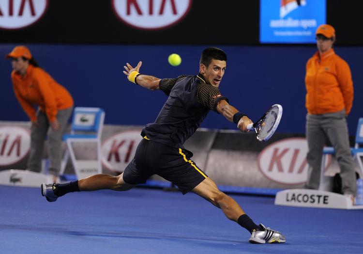 yderligt. der blev spillet helt ud i hjørnerne fra begge kombattanter, men verdensetteren Novak Djokovic tog sejren til sidst i et tæt femte sæt mod Stanislas Wawrinka. 