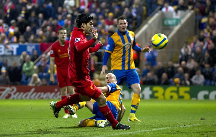 kontroversiel. Luis Suarez har været en fantastisk målscorer for Liverpool, som dog kan få svært ved at holde på angriberen. 