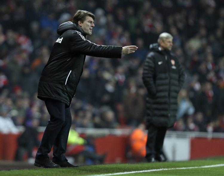 succes. Swansea-træner Michael Laudrup bringes nu pludselig i spil til store trænerjob i blandt andet Chelsea og Real Madrid. 