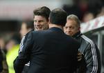 Michael Laudrup og Swansea er to pladser foran Liverpool i Premier League. 