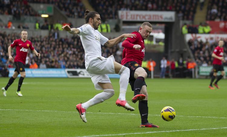 FORMDYK. Wayne Rooney havde ikke en af sine bedste kampe, da Manchester United spillede 1-1 mod Swansea. 