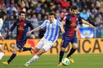 Rivalmøder. Fabregas (t.h.) og Messi (t.v.)  kommer til at se en del til Real Madrid-spåillerne i de kommende 5-6 uger. 