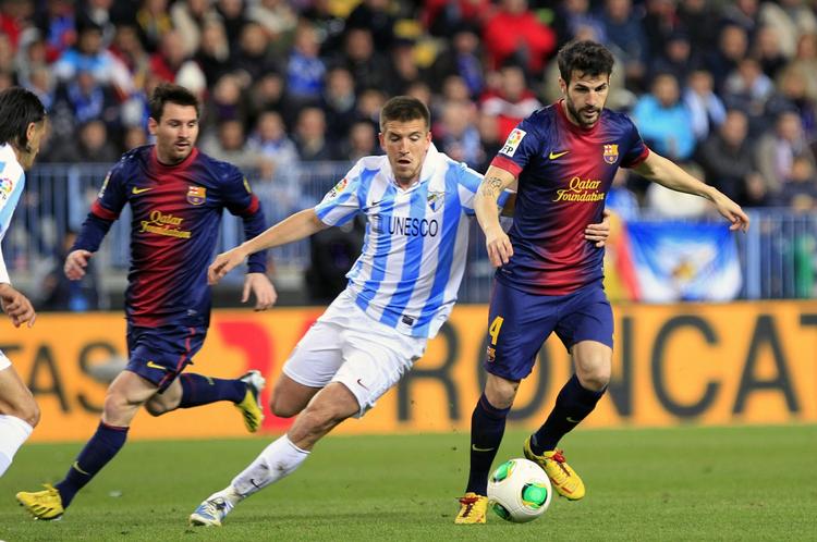 Rivalmøder. Fabregas (t.h.) og Messi (t.v.)  kommer til at se en del til Real Madrid-spåillerne i de kommende 5-6 uger. 