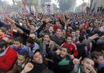 HOOLIGANDOMME. Tilhængere af fodboldklubben al-Ahly i Kairo fejrer dødsdommene over de fodboldhooligans, der anstiftede dødelige optøjer på et stadion i Port Said. 