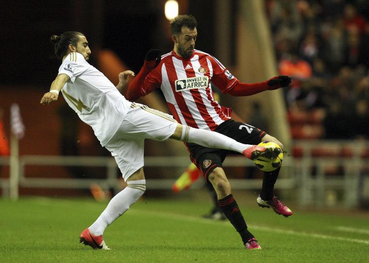 uafgjort. Sunderlands Steven Fletcher (th) fik ikke meget at arbejde med i kampen mod Swansea, som fik lov at dominere store dele af opgøret. 