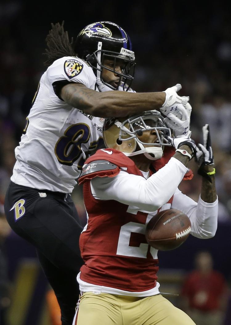 grebet. San Francisco 49ers back Chris Culliver (nr. 29) fanger en aflevering til Baltimore Ravens Torrey Smith. 