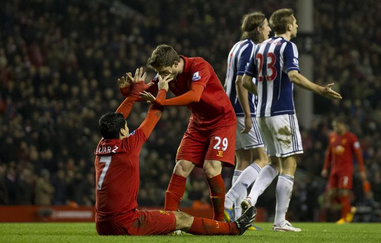 AV. Ikke nok med at Luis Suarez utilsigtet tkom til at jage en finger i ansigtet på Fabio Borini, Liverpool fik også klø af gæsterne fra West Bromwich Albion. 