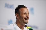 En smilende Pistorius under et pressemøde under handicap-OL i London, 2012. 