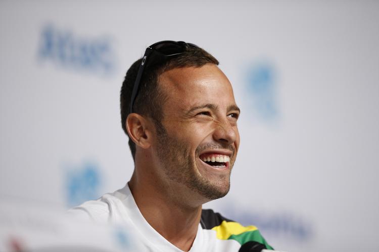 En smilende Pistorius under et pressemøde under handicap-OL i London, 2012. 