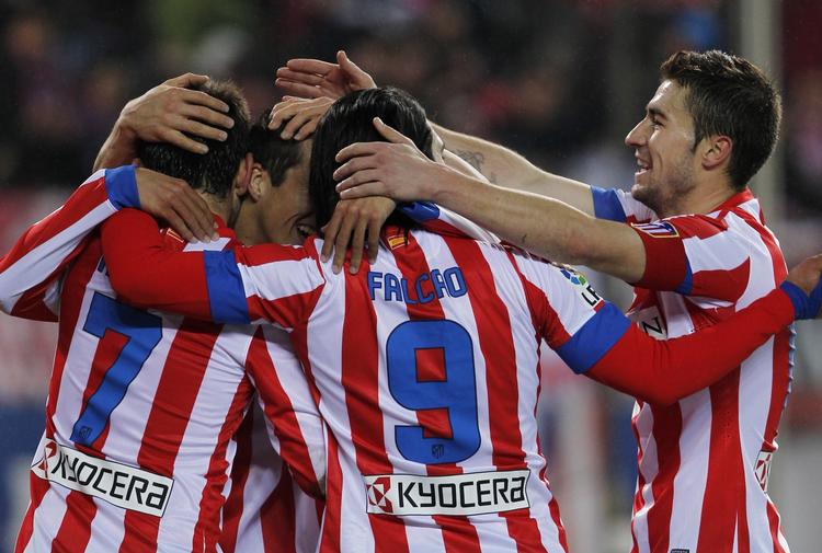 Andenplads. Afstanden til Barcelona er fortsat 12 point, men Atletico Madrid holder bysbørnene fra Real bag sig. 