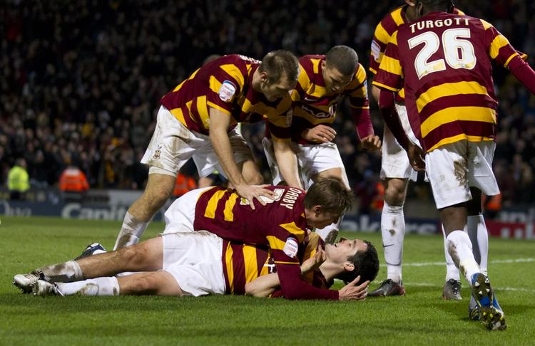 Sensationen. Swansea er det fjerde hold fra Premier League, Bradford skal møde i ligacuppen. 