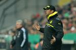 verbalt. Dortmund-træner Jürgen Klopp (th) får svar på tiltale af kollegaen fra Bayern, Jupp Heynckes (tv). 