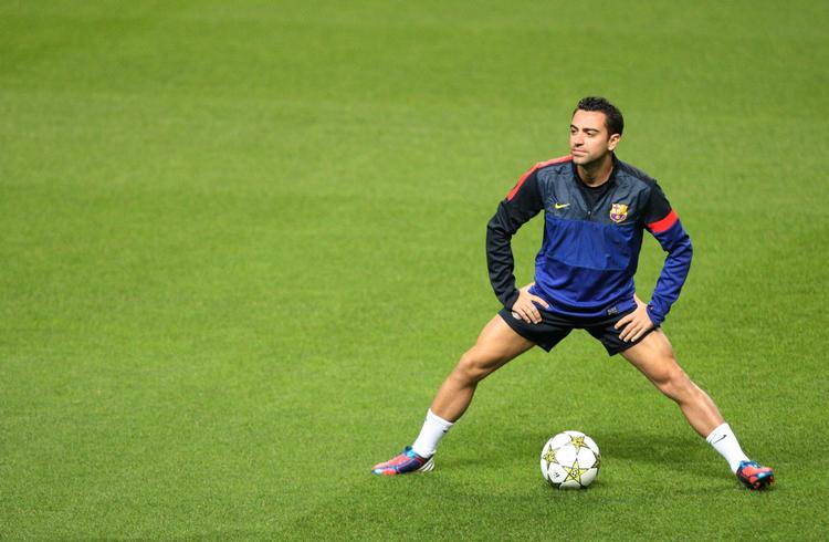 strateg. Xavi bliver svær at undvære for Barcelona i kampen mod AC Milan. 