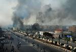 Sammenstød. Røgen steg op over Port Said efter urolighederne. 