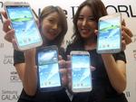 INNOVATION. 14. marts viser Samsung det næste bud på en Galaxy S-telefon frem, den fjerde i rækken. Efters sigende kan den rulle skærmen ned ad, hvis du bare kigger rigtigt på den. (Foto: Ahn Young-joon, AP Photo) 