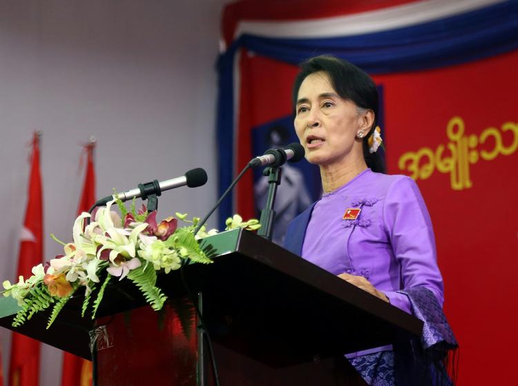 Frontfigur. Fire partimedlemmer blev forment adgang til NLD's partikongres, hvor Aung San Suu Kyi blev genvalgt som formand. 