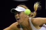 Kvartfinalist. Efter sejr over Nadia Petrova skal Caroline Wozniacki møde hviderusseren Viktoria Azarenka. 