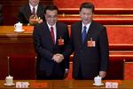 Permierminister. Li Keqiang (til venstre) forventes at sidde på posten som premierminister de næste ti år. 
