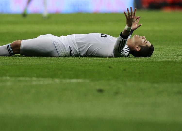 Fagter. Real Madrid's Cristiano Ronaldo på grønsværen mod Mallorca. 