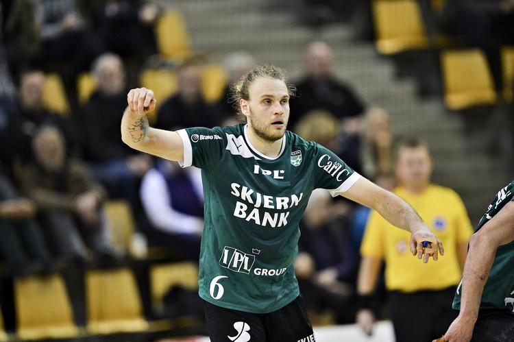 Sejr. Henrik Mølgaard og de øvrige Skjern-spillere kan glæde sig over et fint udgangspunkt for slutspillet. 