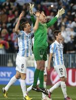 Nedtur. Malaga-spillerne kom ne dpå jorden igen efter den flotte 2-0-sejr i Champions League. 